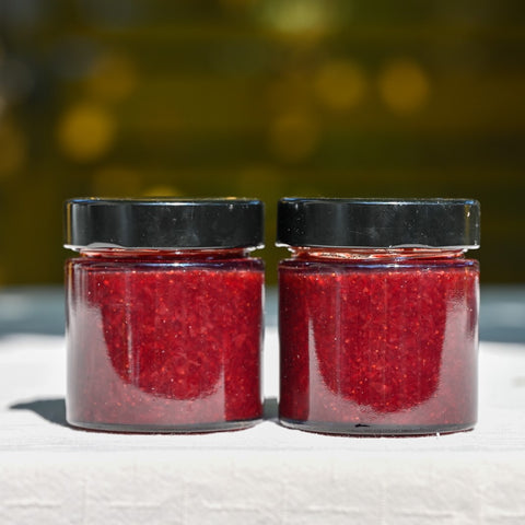 Two jars of strawberry and tequila jam