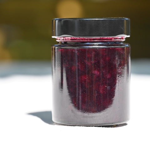 A jar of wild blueberry and gin jam