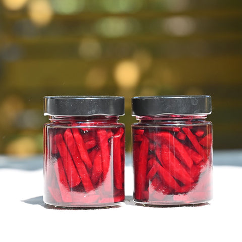Two jars of pickled beets