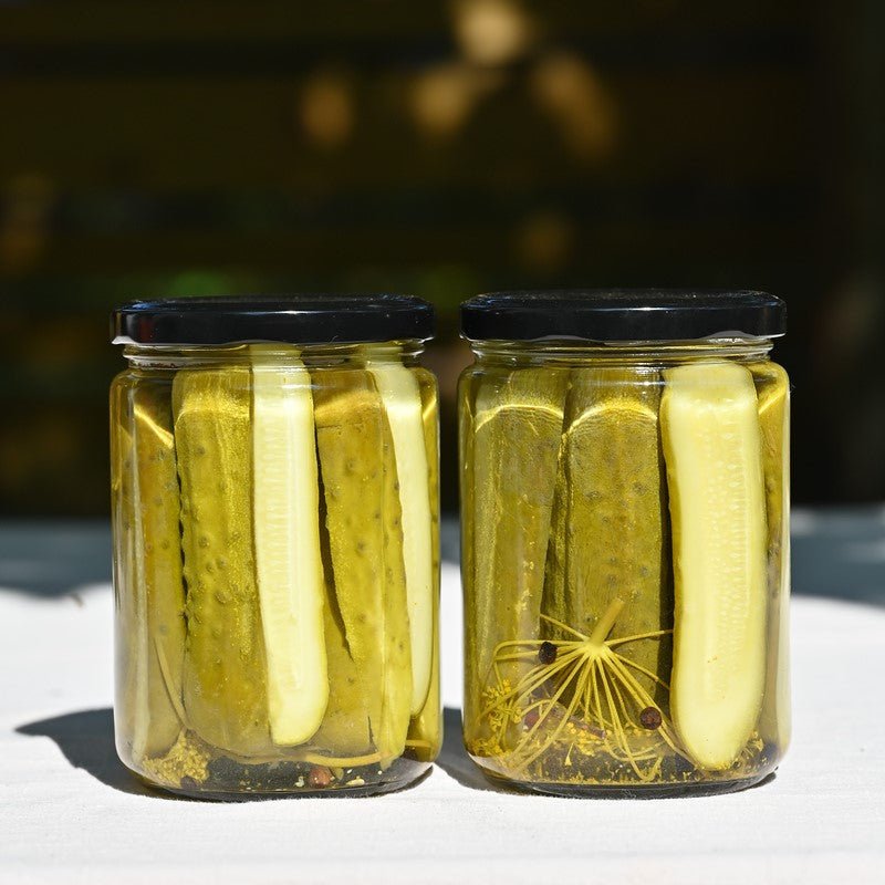 Two jars of spicy dill pickles