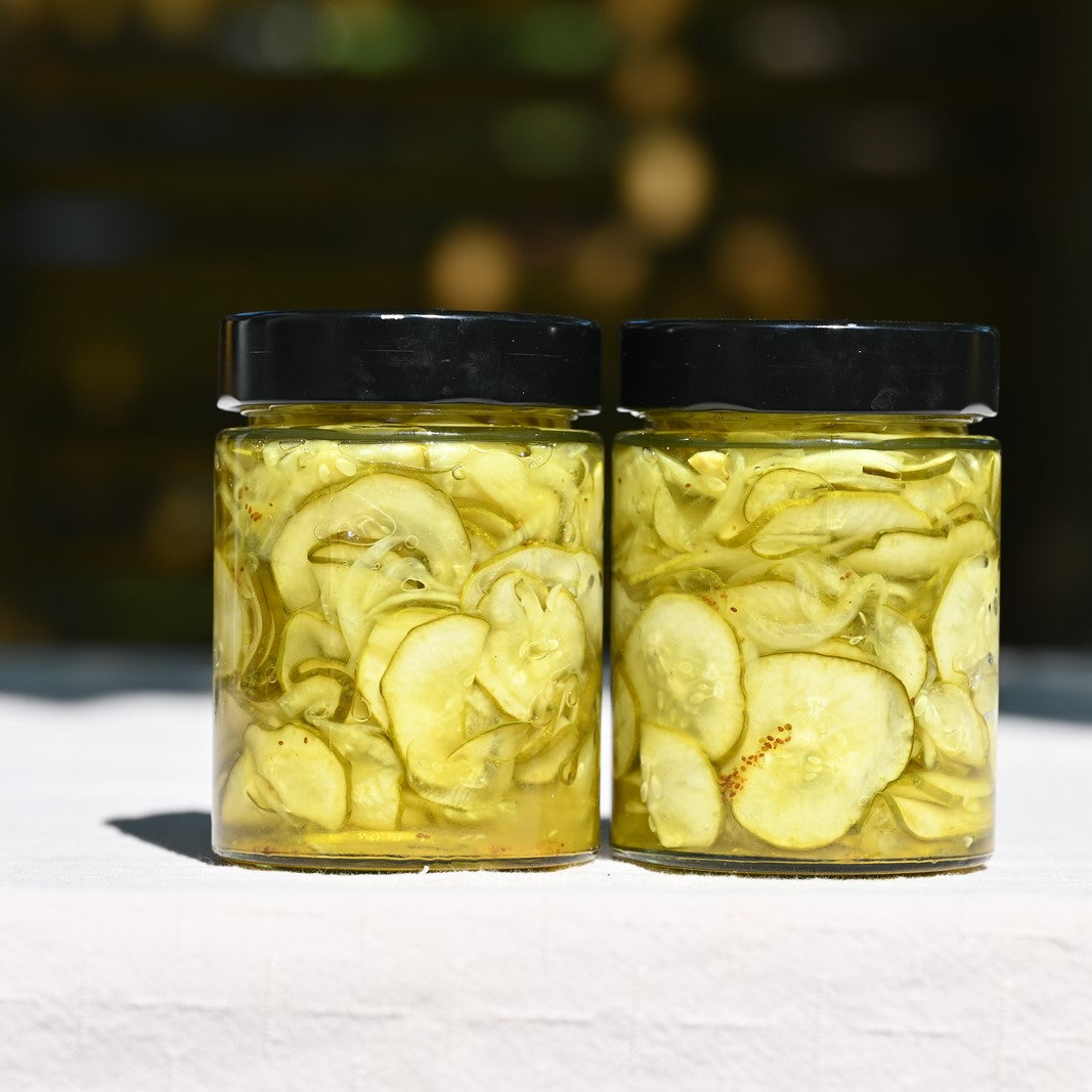 Two jars of bread and butter pickles