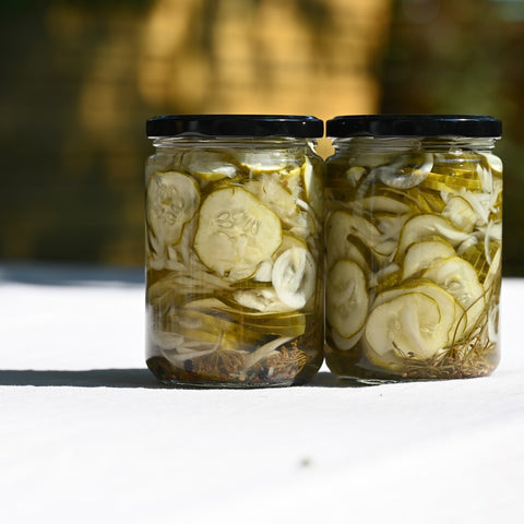 Two jars of sliced dill pickles 