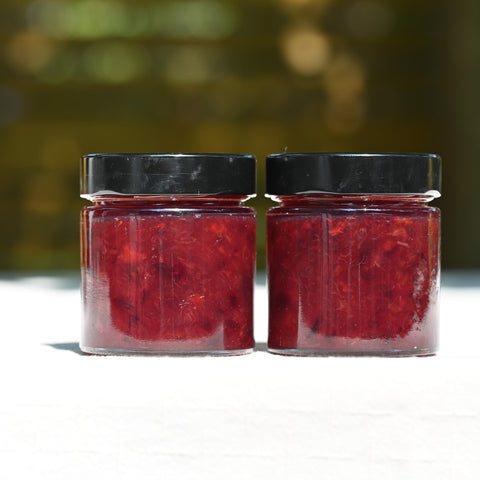 Two jars of plum jam