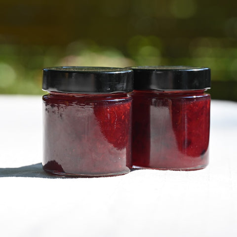 Two jars of plum jam