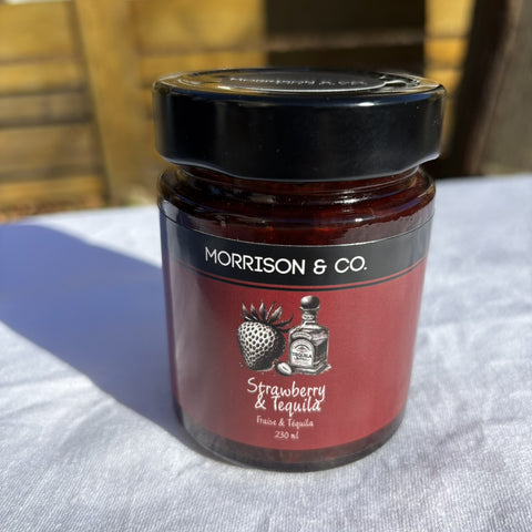 A jar of strawberry and tequila jam with a label that reads 'Strawberry & Tequila' and the brand 'Morrison & Co'.